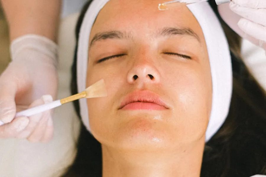 Woman receiving a professional cosmetic facial treatment